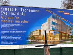 Sign describing and artist rendering of the Tschannen eye institute