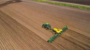 Aerial view of John Deere equipment at use during planting season